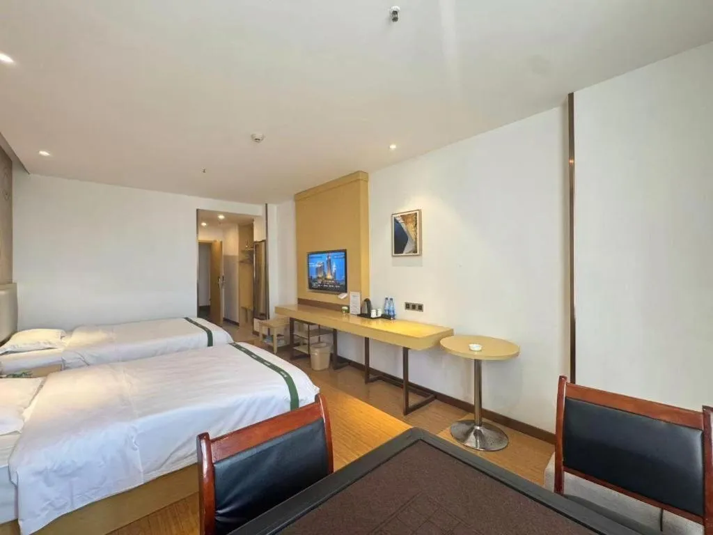 Bed in GreenTree Inn Huanggang City Wuxue City Kanjiang Avenue