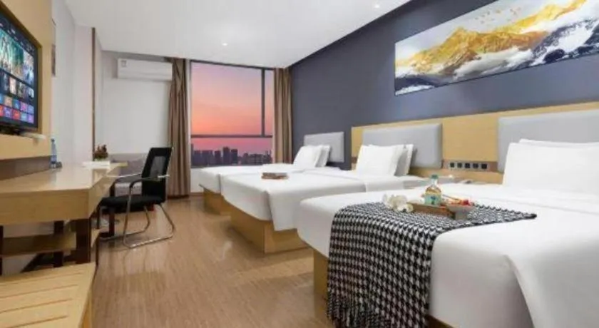 Bed in GreenTree Inn Huanggang City Wuxue City Kanjiang Avenue