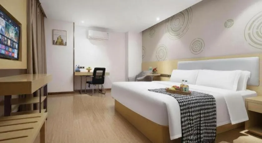 Bed in GreenTree Inn Huanggang City Wuxue City Kanjiang Avenue