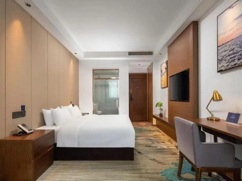 Bed in GME Taizhou Jingjiang City Bus Station Hotel