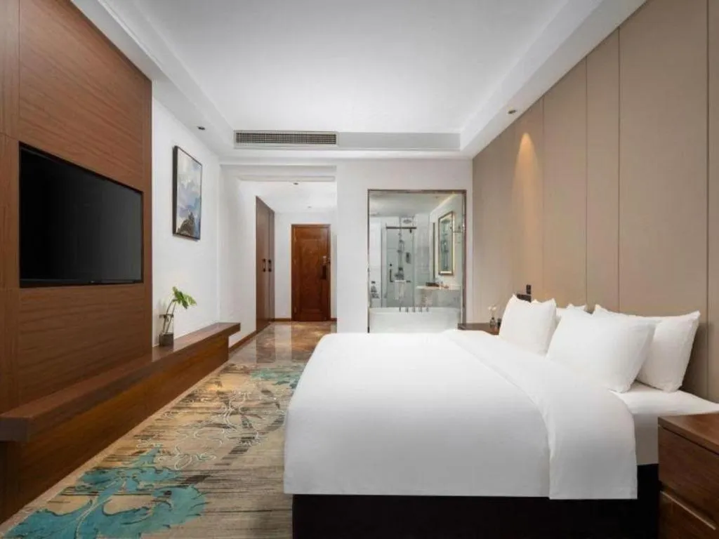 Bed in GME Taizhou Jingjiang City Bus Station Hotel