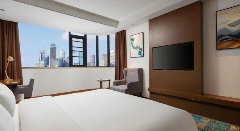 Bed in GME Taizhou Jingjiang City Bus Station Hotel