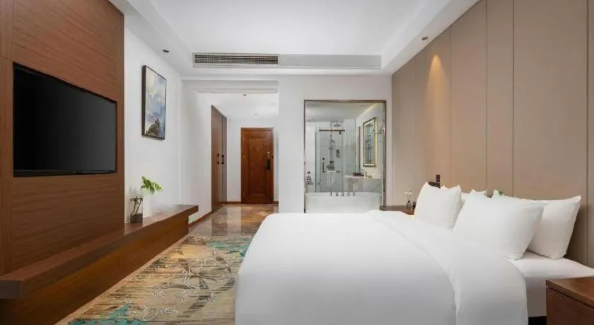 Bed in GME Taizhou Jingjiang City Bus Station Hotel