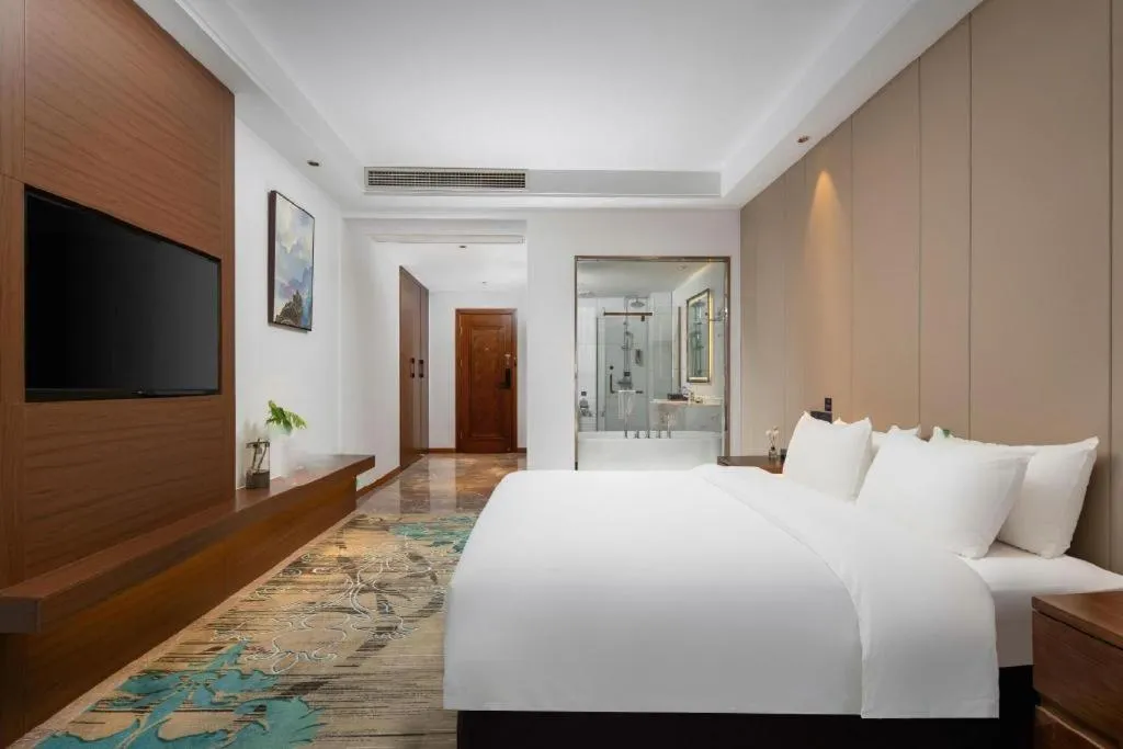 Bed in GME Taizhou Jingjiang City Bus Station Hotel