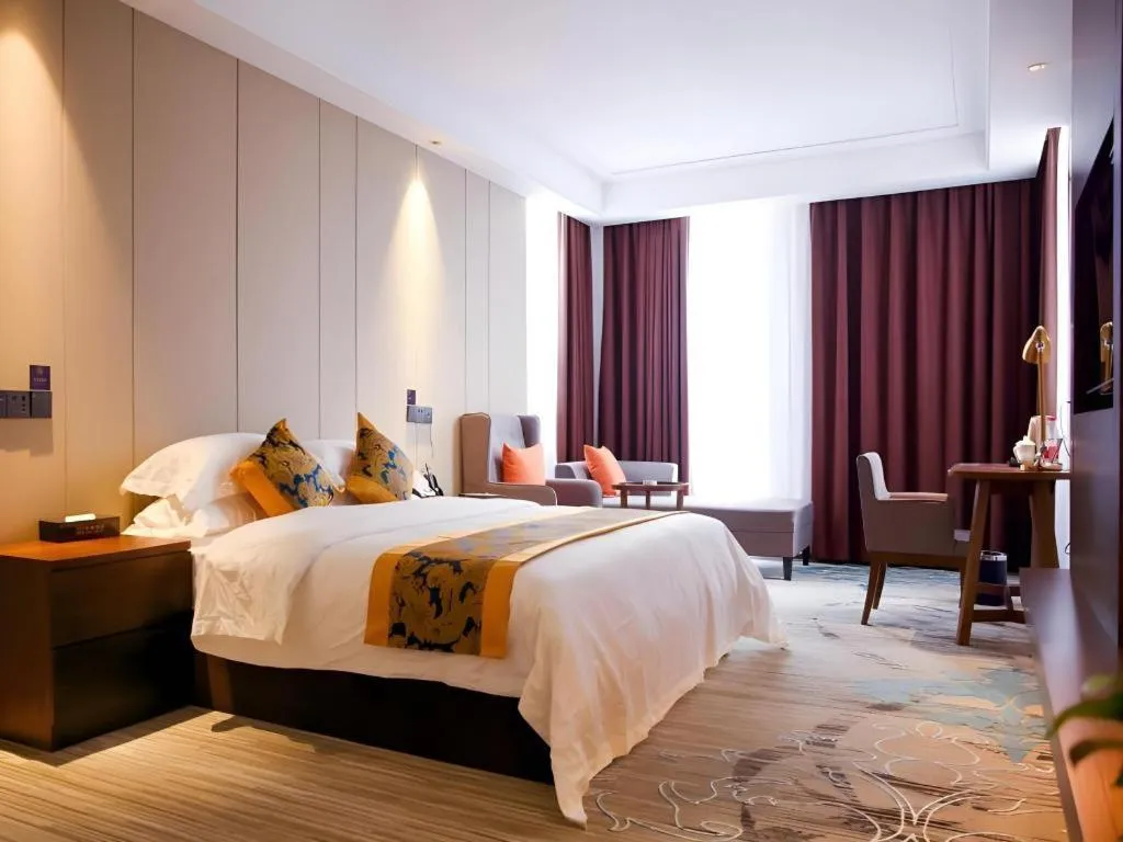 Bed in GME Taizhou Jingjiang City Bus Station Hotel