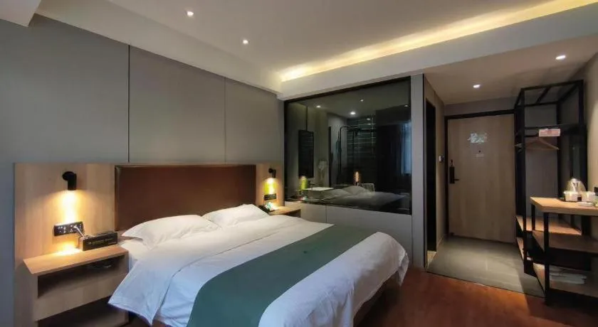 Bed in GreenTree Inn Wuxi Quanshan Center