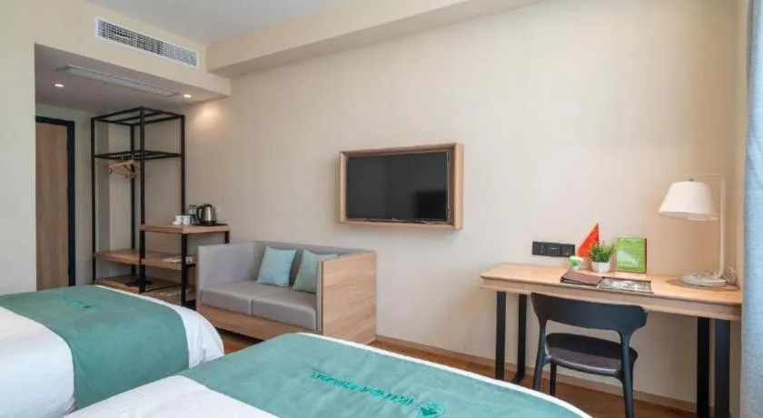 Bed in GreenTree Inn Wuxi Quanshan Center