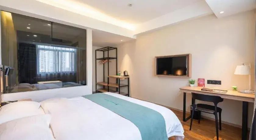 Bed in GreenTree Inn Wuxi Quanshan Center Bed in GreenTree Inn Wuxi Quanshan Center