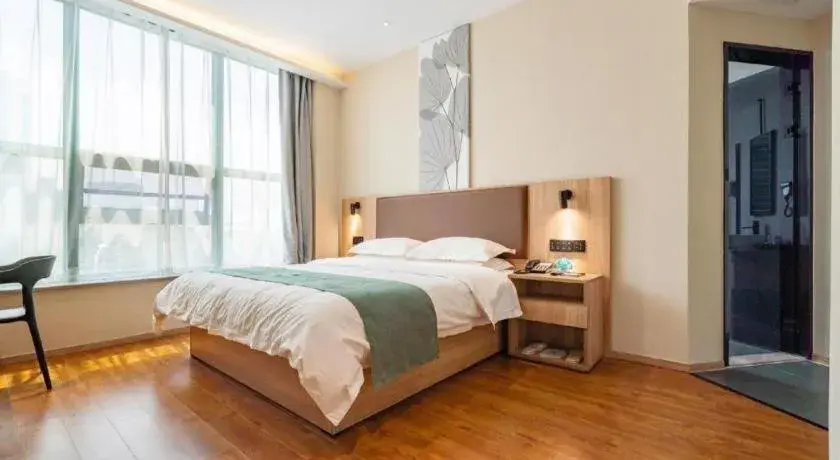 Bed in GreenTree Inn Wuxi Quanshan Center Bed in GreenTree Inn Wuxi Quanshan Center