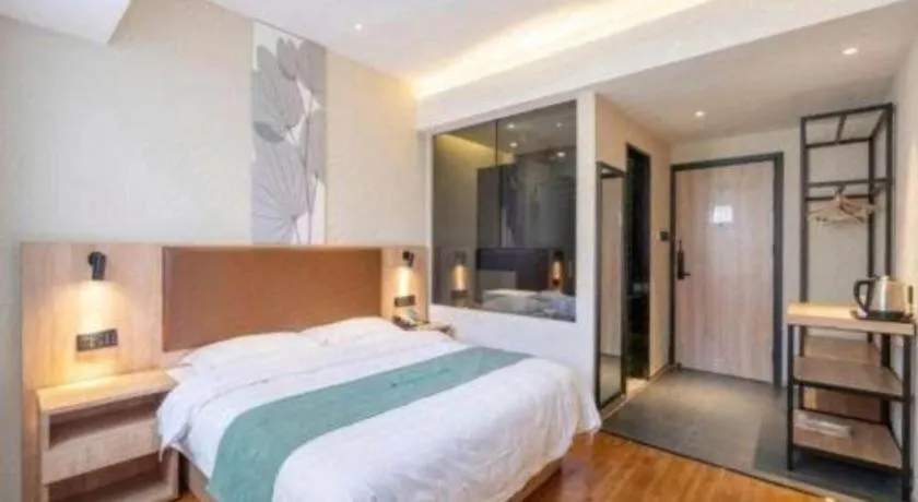 Bed in GreenTree Inn Wuxi Quanshan Center