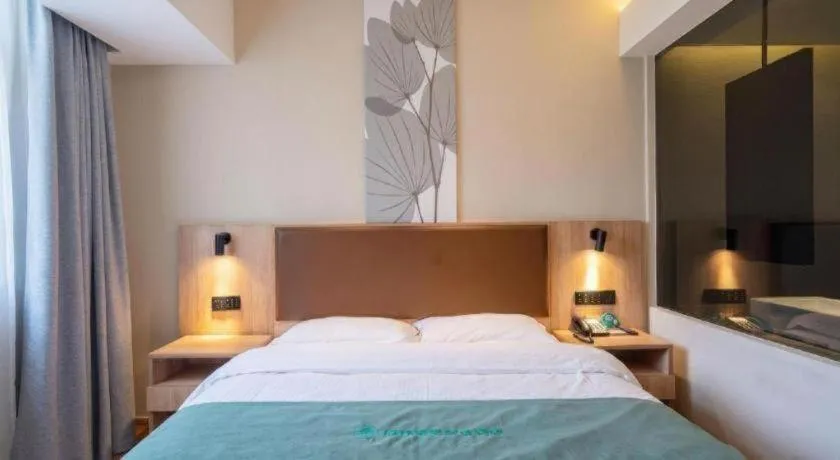 Bed in GreenTree Inn Wuxi Quanshan Center