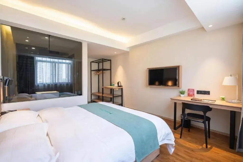 Bed in GreenTree Inn Wuxi Quanshan Center Bed in GreenTree Inn Wuxi Quanshan Center