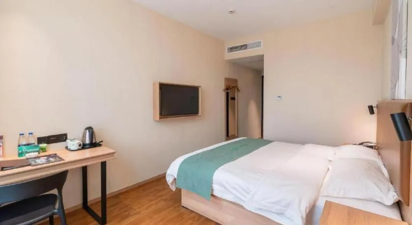 Bed in GreenTree Inn Wuxi Quanshan Center