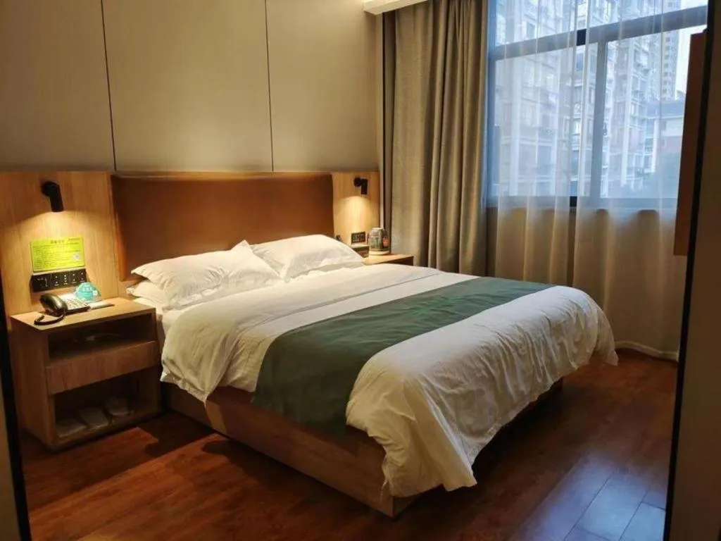 Bed in GreenTree Inn Wuxi Quanshan Center