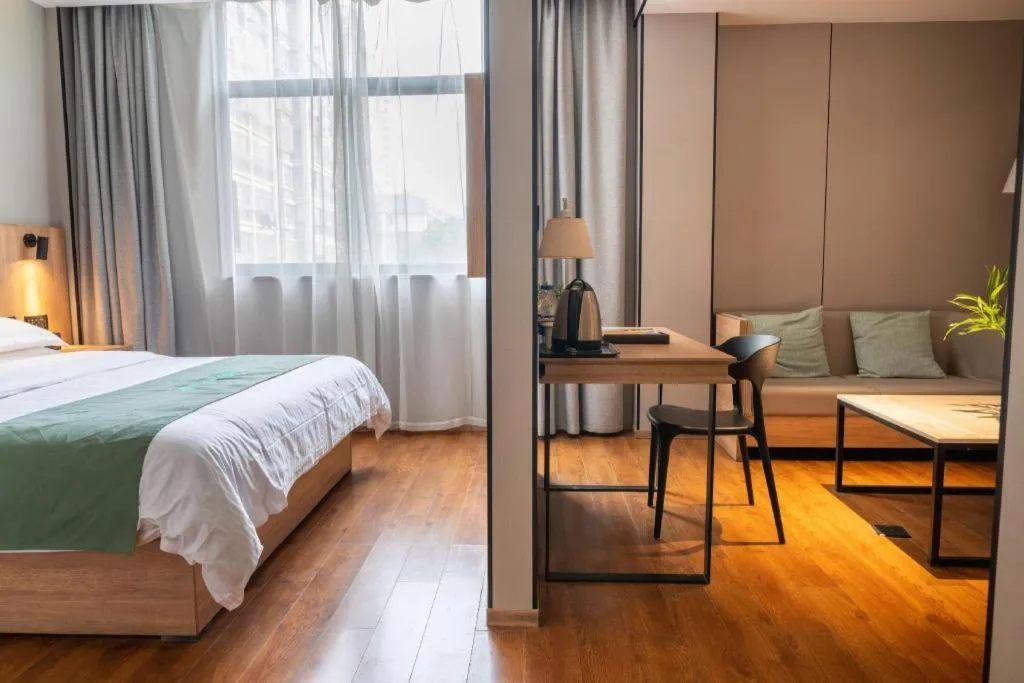 Bed in GreenTree Inn Wuxi Quanshan Center