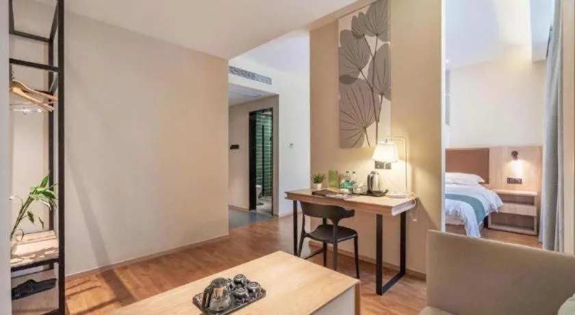 Bed in GreenTree Inn Wuxi Quanshan Center