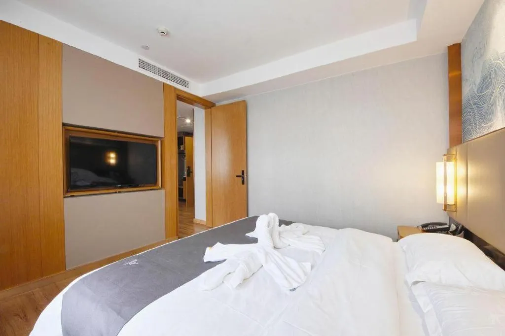 Bed in GreenTree Eastern Hotel Huai'an Bus Station Zhou Enlai Memorial