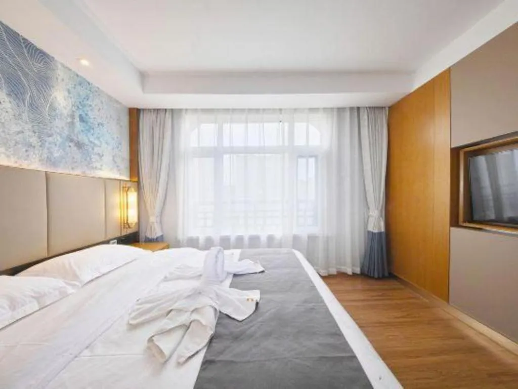 Bed in GreenTree Eastern Hotel Huai'an Bus Station Zhou Enlai Memorial