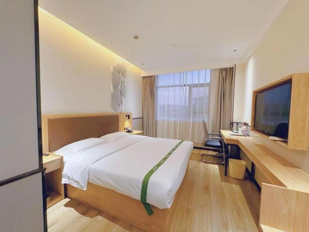 Bed in GreenTree Inn Nanjing Baijiahu