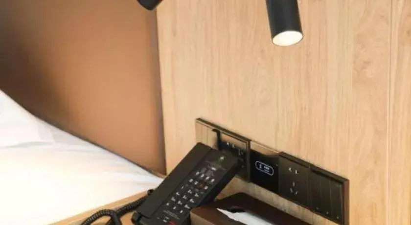 Bed in GreenTree Inn Nanjing Baijiahu Bed in GreenTree Inn Nanjing Baijiahu