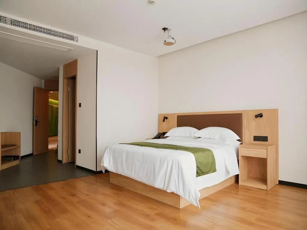 Bed in GreenTree Inn Nanjing Baijiahu