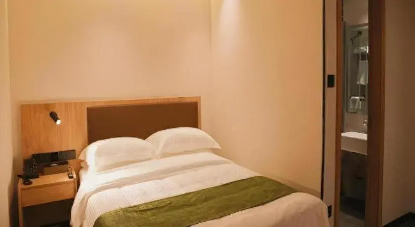 Bed in GreenTree Inn Nanjing Baijiahu Bed in GreenTree Inn Nanjing Baijiahu