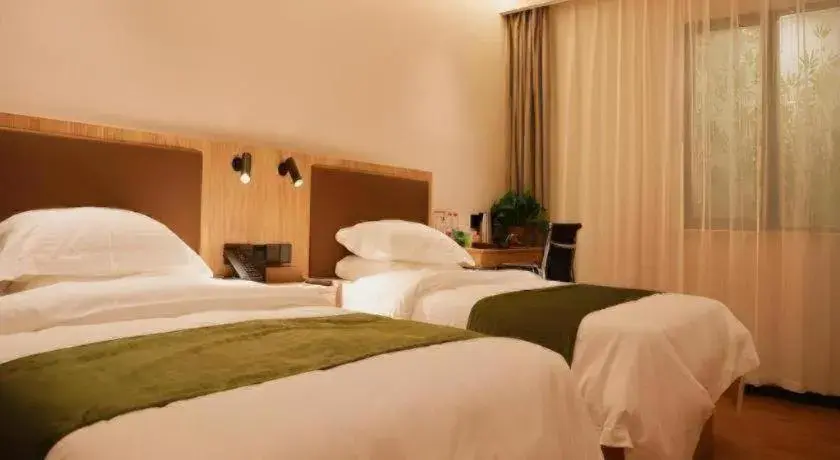 Bed in GreenTree Inn Nanjing Baijiahu Bed in GreenTree Inn Nanjing Baijiahu