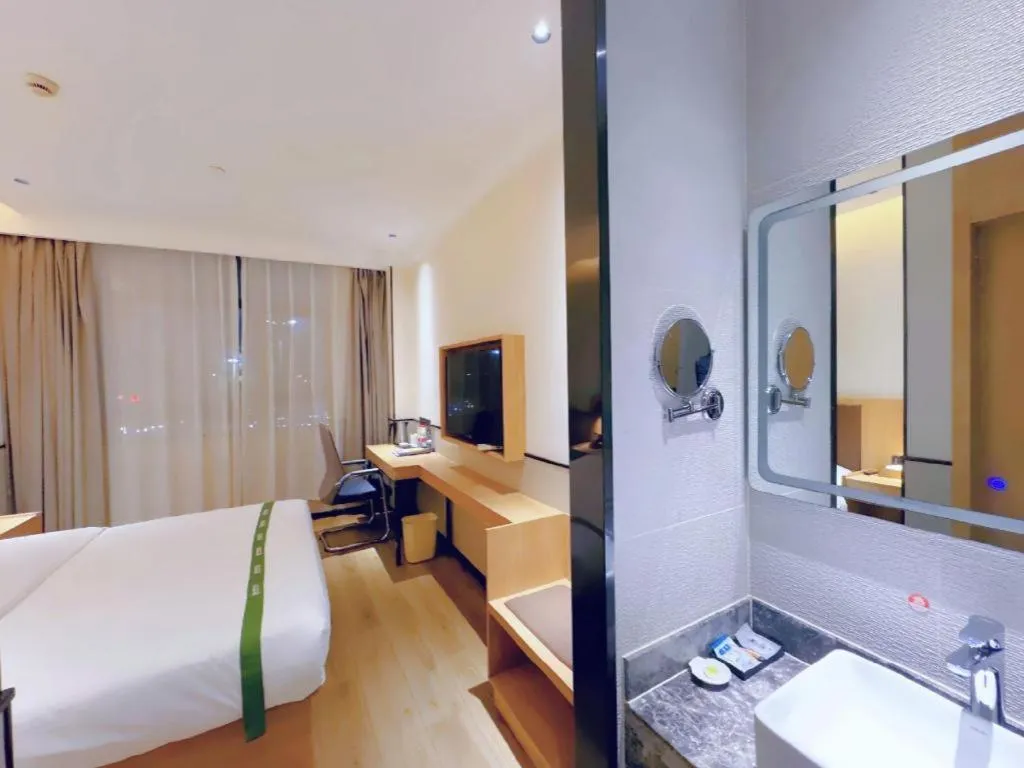 Bed in GreenTree Inn Nanjing Baijiahu