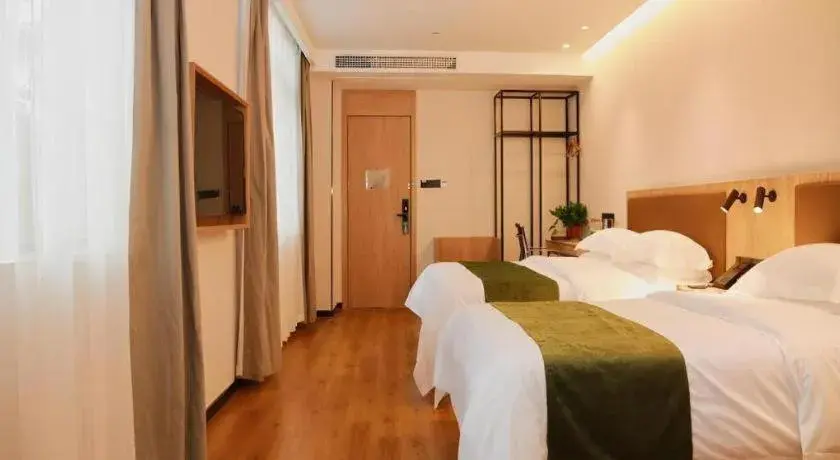 Bed in GreenTree Inn Nanjing Baijiahu Bed in GreenTree Inn Nanjing Baijiahu