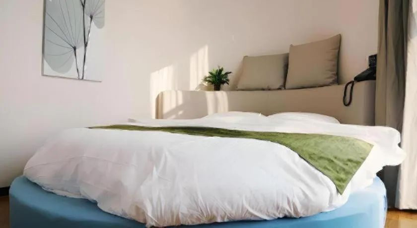 Bed in GreenTree Inn Nanjing Baijiahu