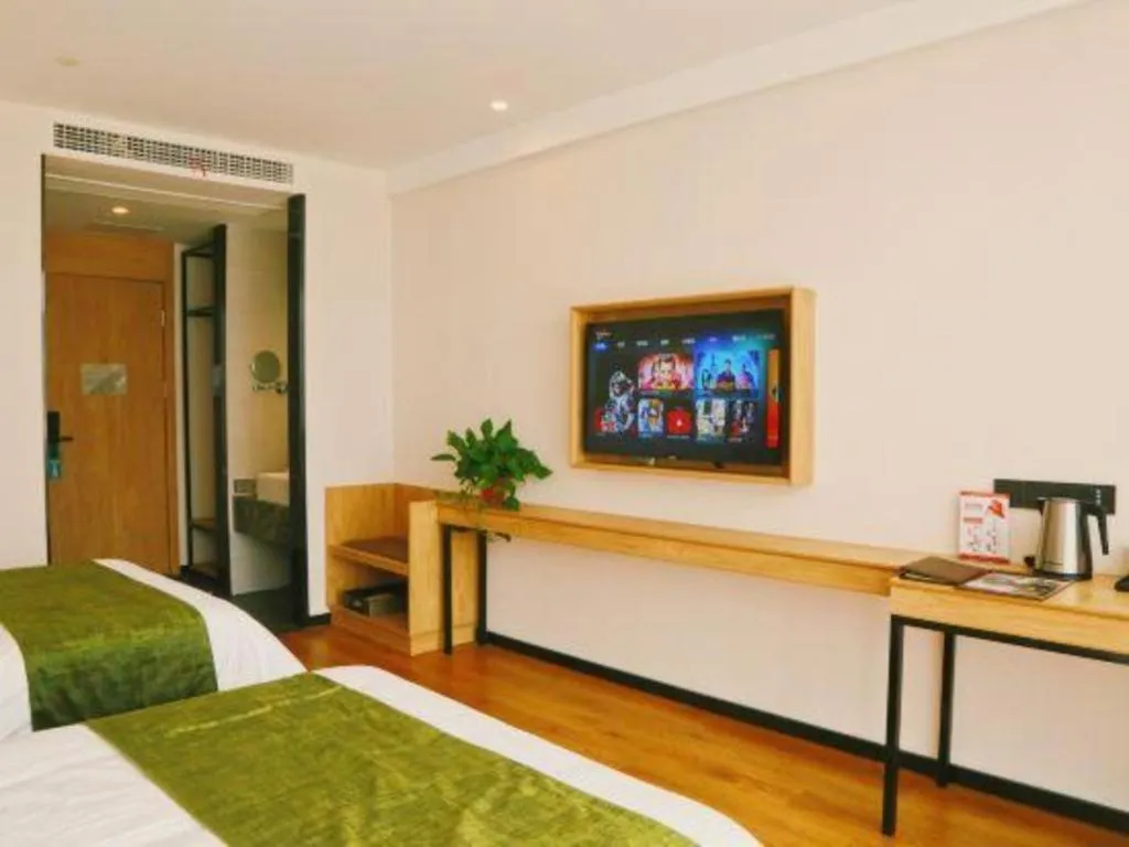 Bed in GreenTree Inn Nanjing Baijiahu