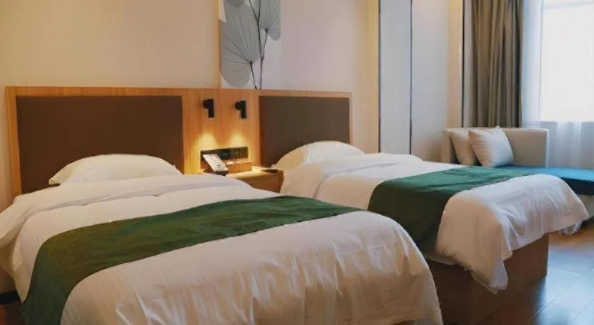 Bed in GreenTree Inn Nanjing Baijiahu