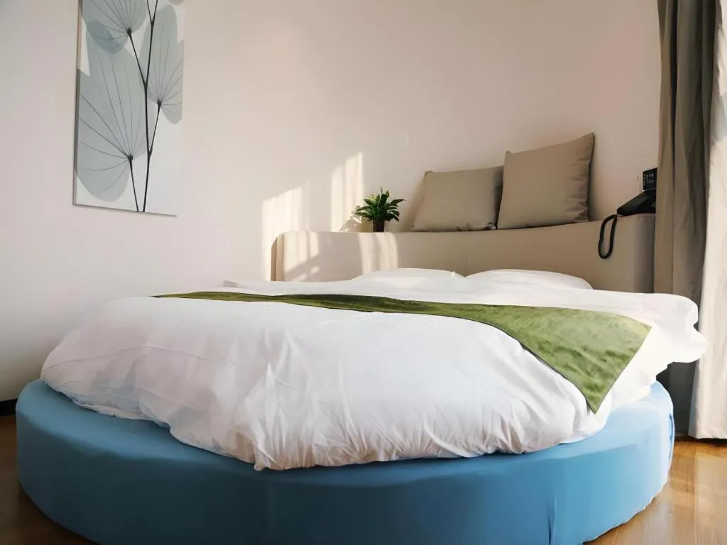 Bed in GreenTree Inn Nanjing Baijiahu