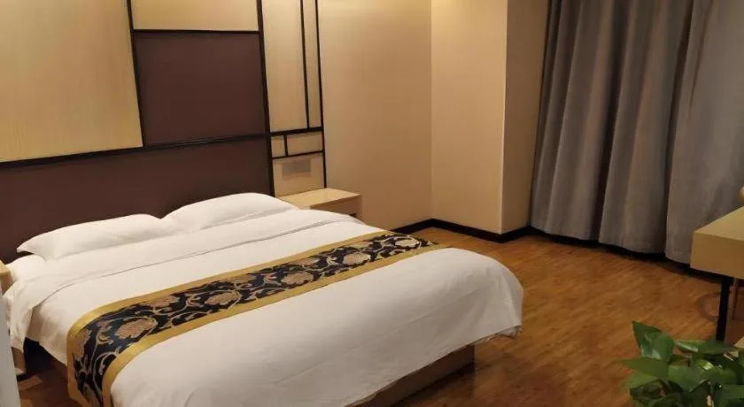 Bed in Shell Taiyuan South Station Shanxi University Hotel