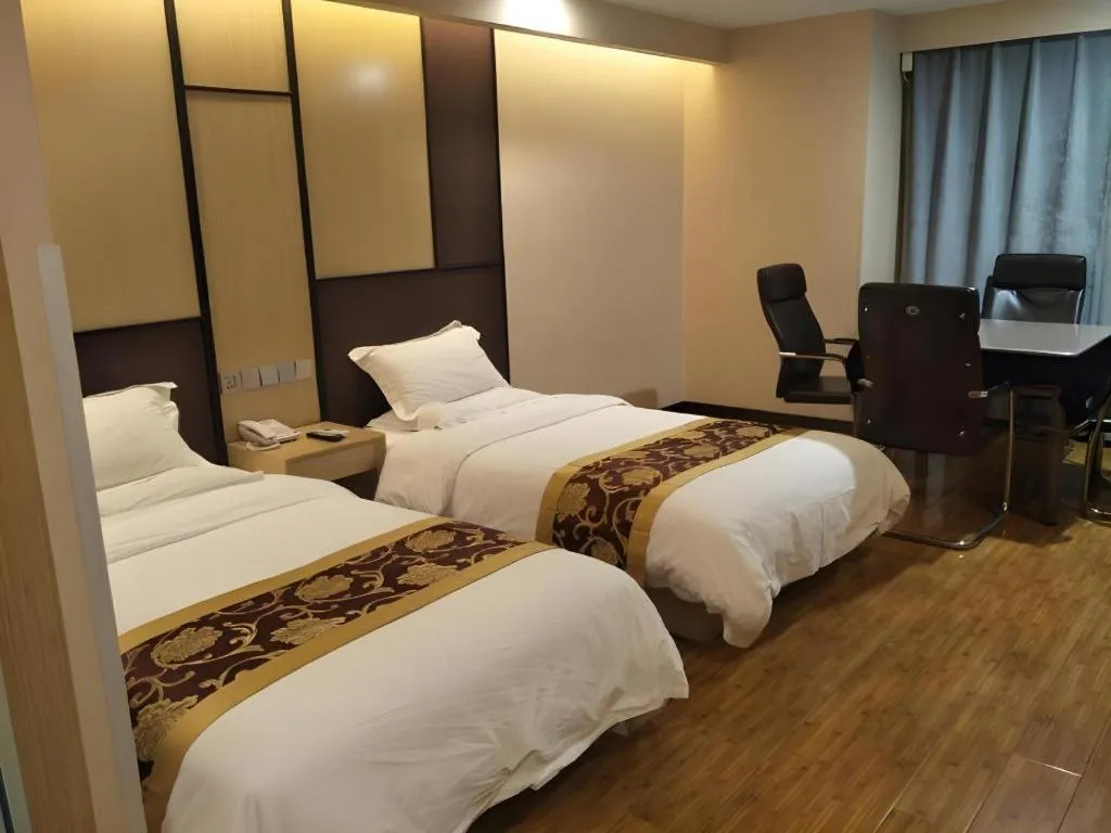 Bed in Shell Taiyuan South Station Shanxi University Hotel