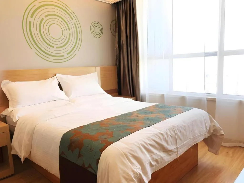 Bed in GreenTree Inn Urumqi Airport Tianyi International City