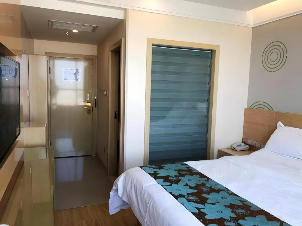 Bed in GreenTree Inn Urumqi Airport Tianyi International City