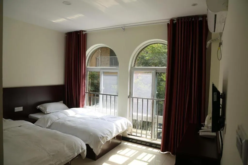 Bed in Shell Zaozhuang Taierzhuang Ancient City East Gate Hotel