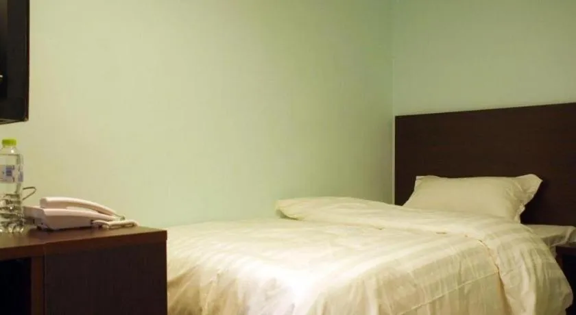 Bed in Shell Zaozhuang Taierzhuang Ancient City East Gate Hotel