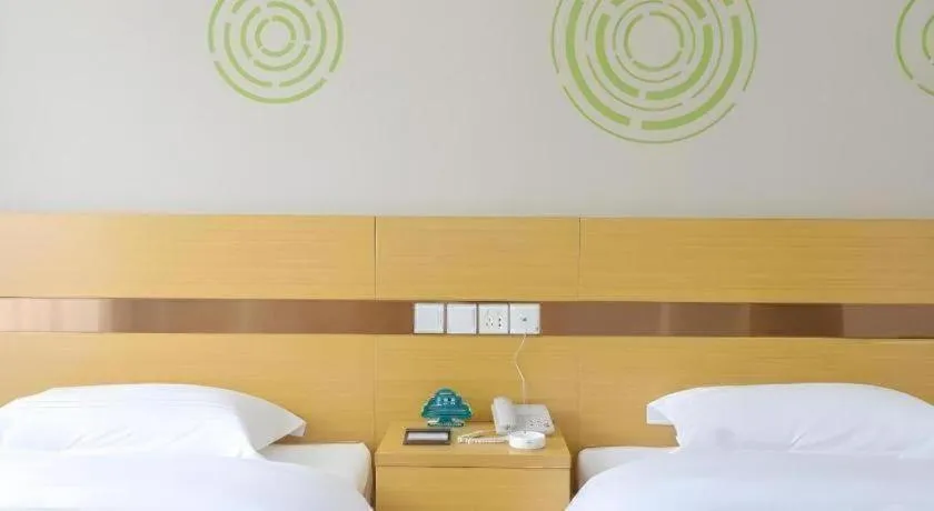 Bed in GreenTree Inn Jiaxin Puyuan Kaixuan Road