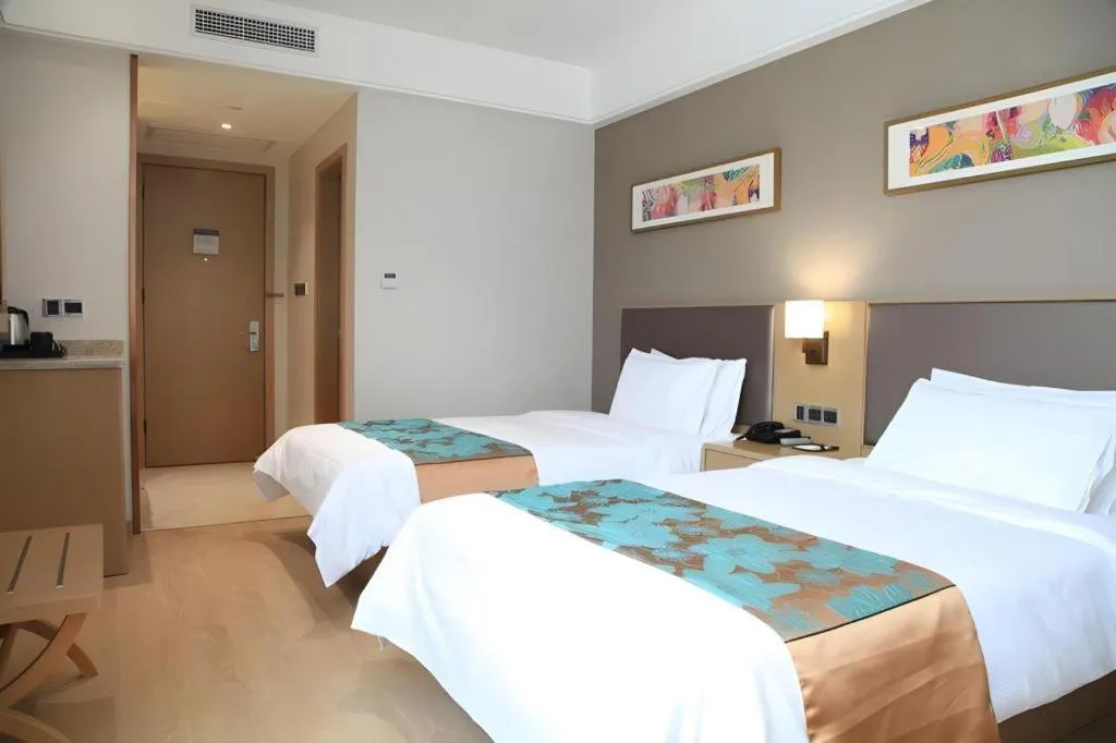Bed in Home Inn Plus Shanghai Middle Ring Jinshajiang Road Fengzhuang Metro Station