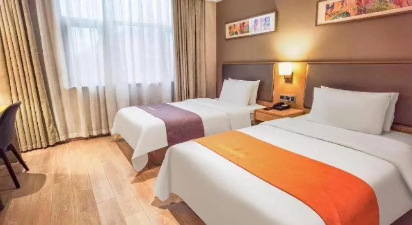 Bed in Home Inn Plus Shanghai Middle Ring Jinshajiang Road Fengzhuang Metro Station