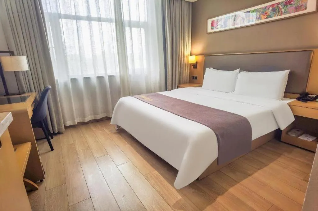 Bed in Home Inn Plus Shanghai Middle Ring Jinshajiang Road Fengzhuang Metro Station
