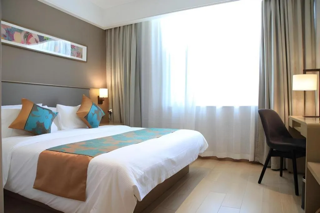 Bed in Home Inn Plus Shanghai Middle Ring Jinshajiang Road Fengzhuang Metro Station