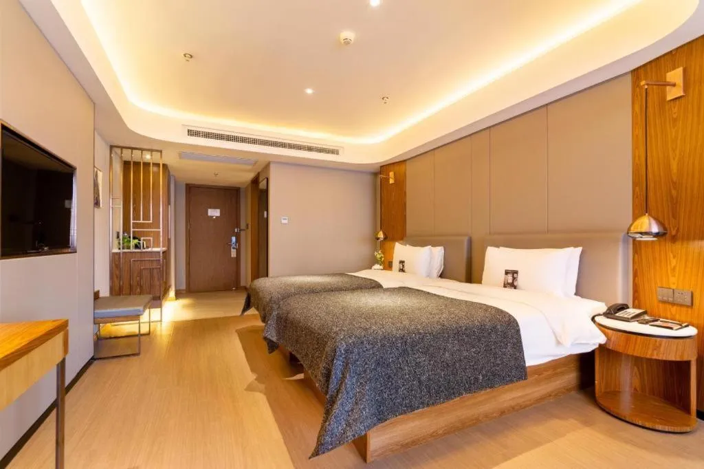 Bed in Yitel Collection Shenyang Hunnan Olympic Sports Center Caixia Street Metro Station