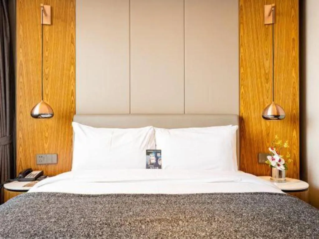 Bed in Yitel Collection Shenyang Hunnan Olympic Sports Center Caixia Street Metro Station