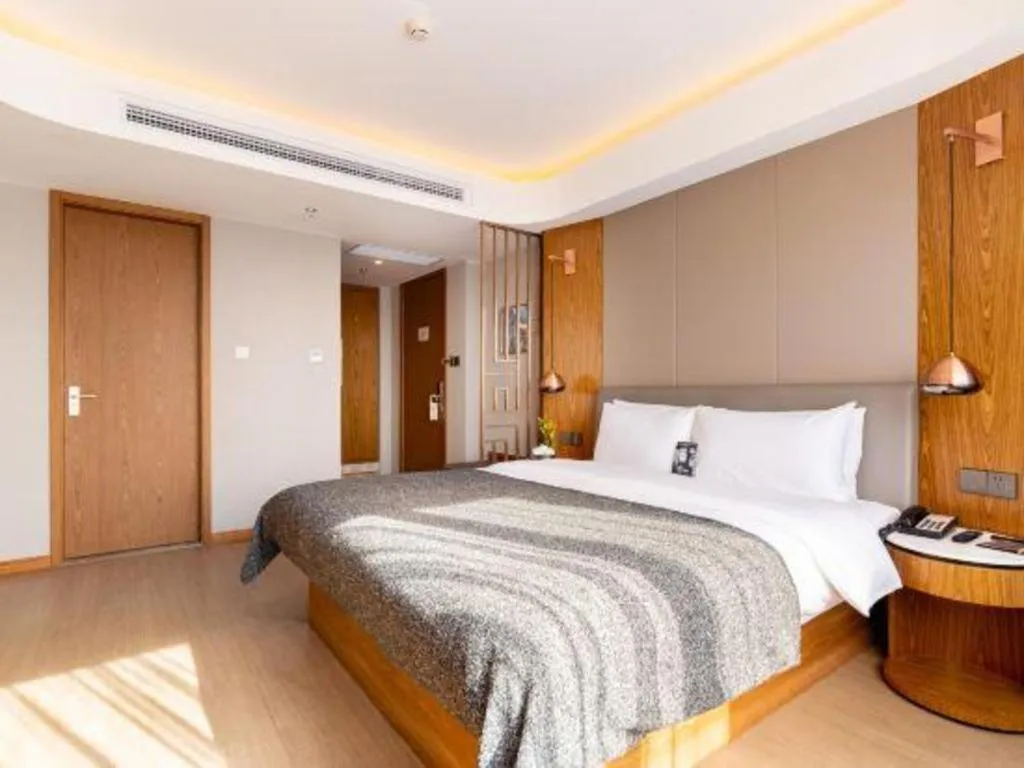 Bed in Yitel Collection Shenyang Hunnan Olympic Sports Center Caixia Street Metro Station