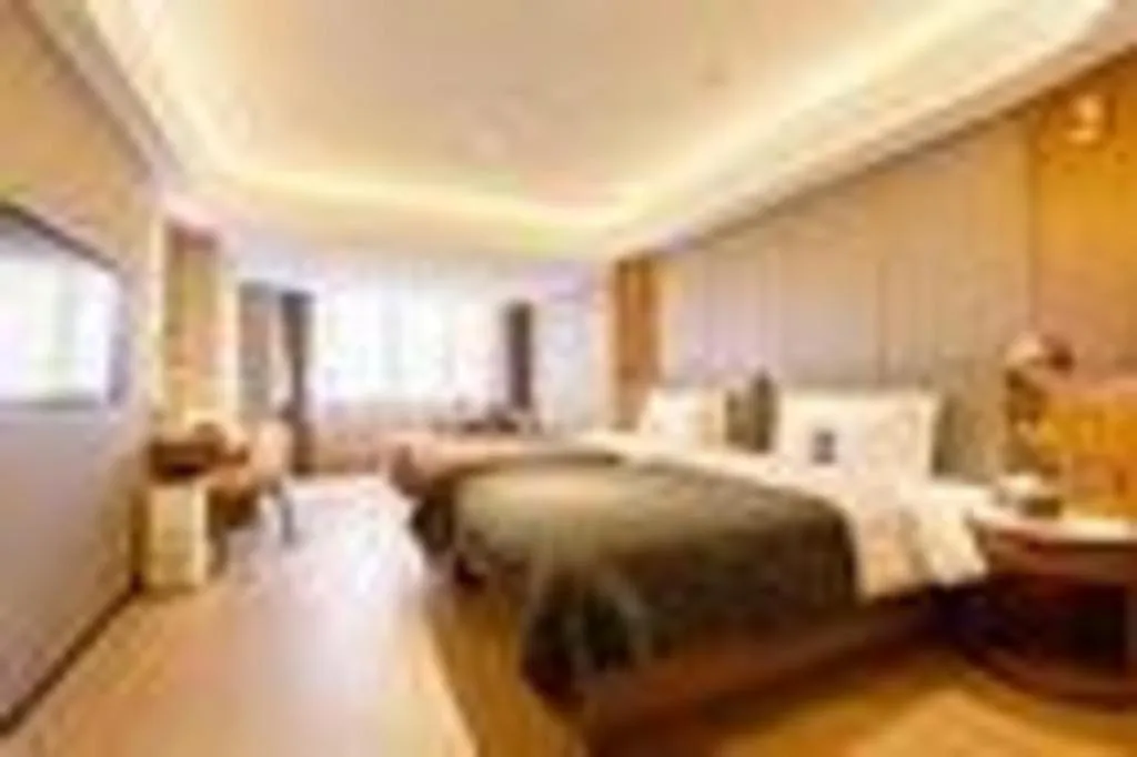 Bed in Yitel Collection Shenyang Hunnan Olympic Sports Center Caixia Street Metro Station
