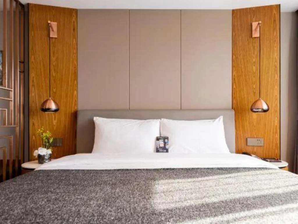 Bed in Yitel Collection Shenyang Hunnan Olympic Sports Center Caixia Street Metro Station