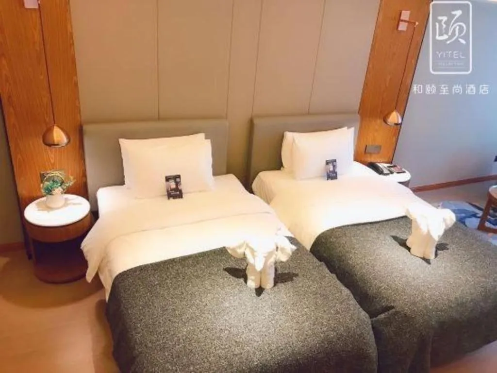 Bed in Yitel Collection Shenyang Hunnan Olympic Sports Center Caixia Street Metro Station
